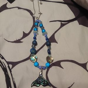 Hand headed whale tail necklace